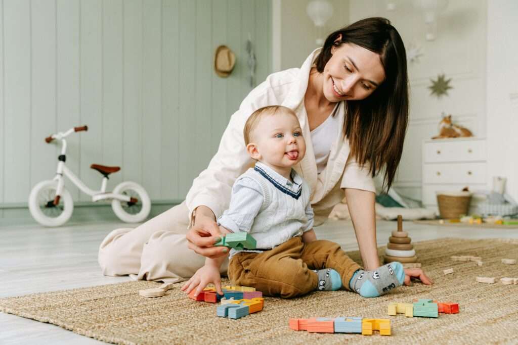 A parent teaching a toddler to wait patiently