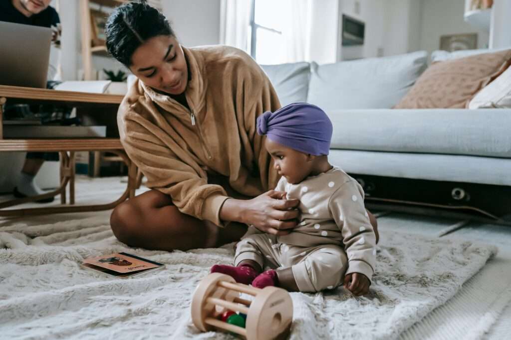 A calm parent guiding a toddler through managing aggression effectively.